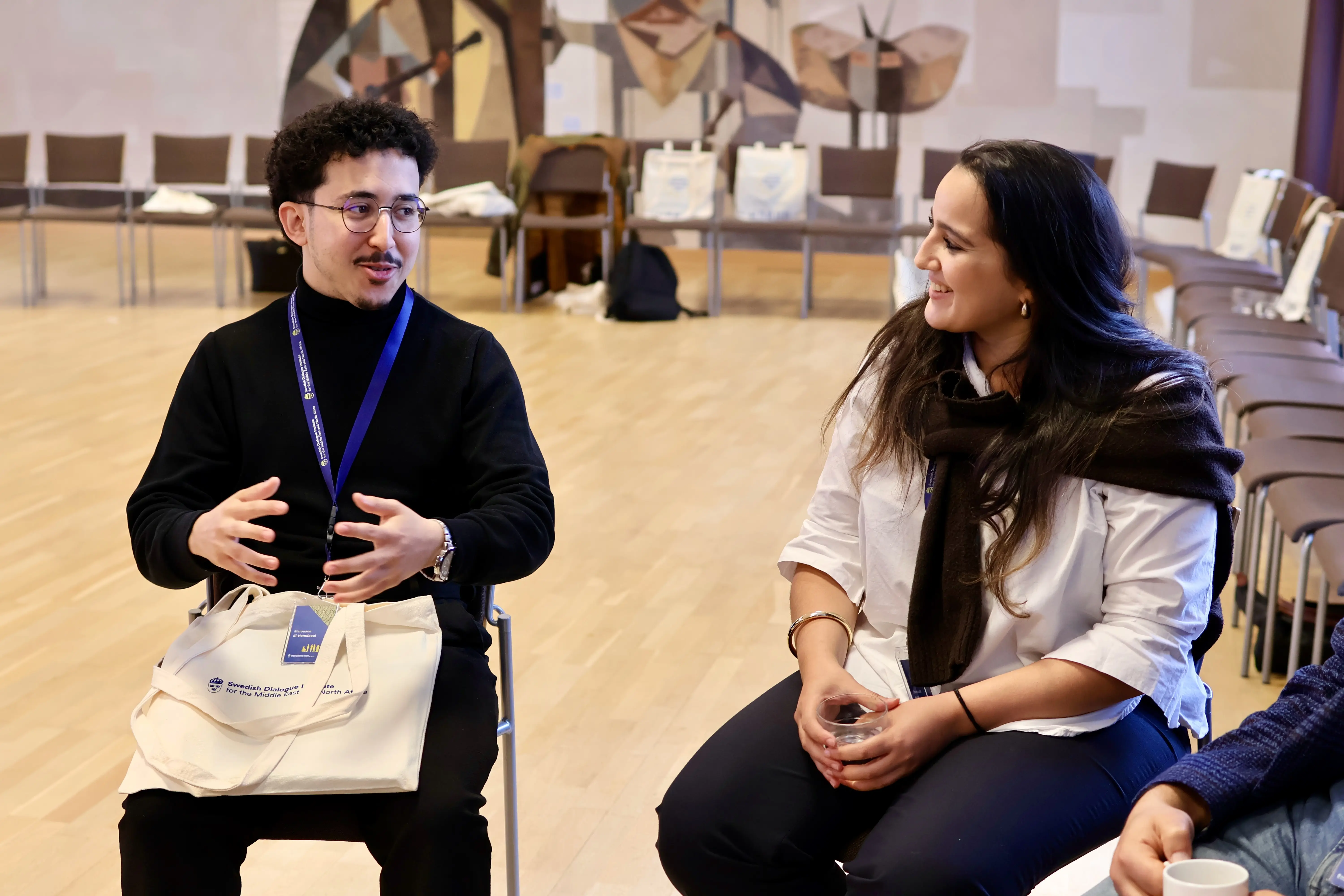 Marouane EL-HAMDAOUI engaging in cross-cultural workshop discussions