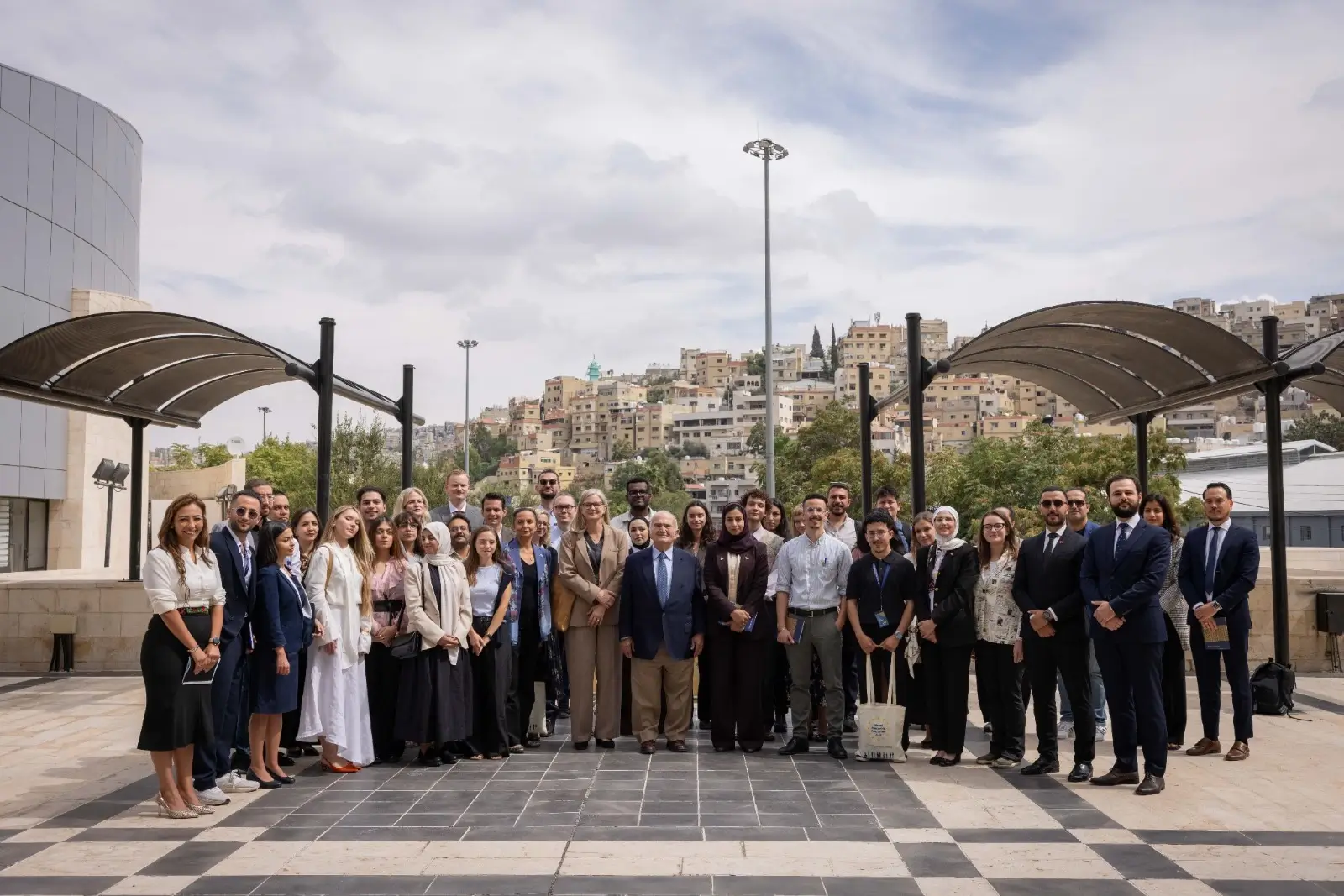 MMP 2026 cohort group photo in Amman with diplomats and organizers